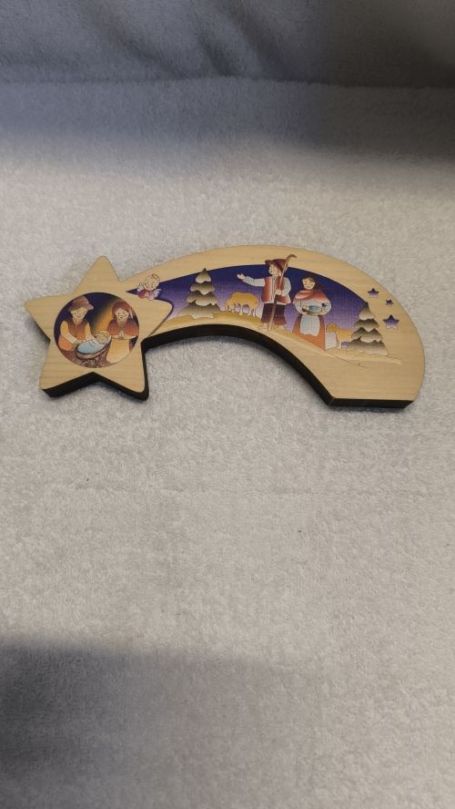  Una stella cadente Ã¨ natalizia in legno