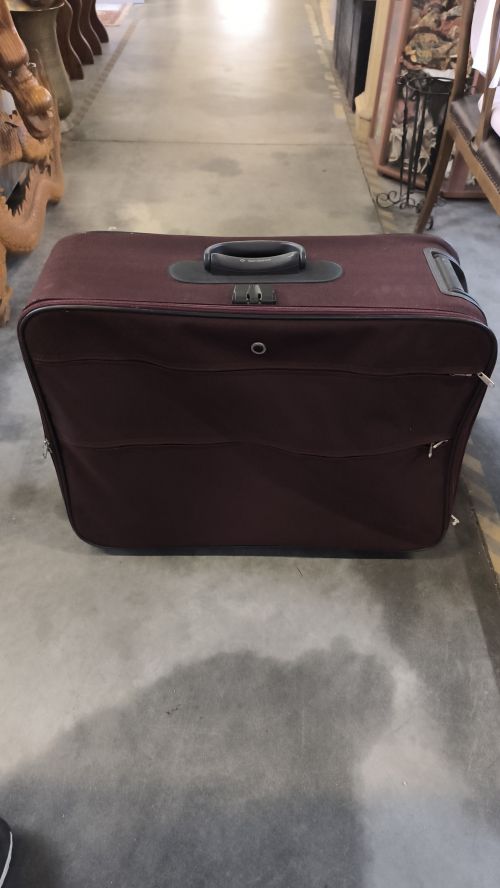 Valigia Samsonite difetto plastiche interna curva