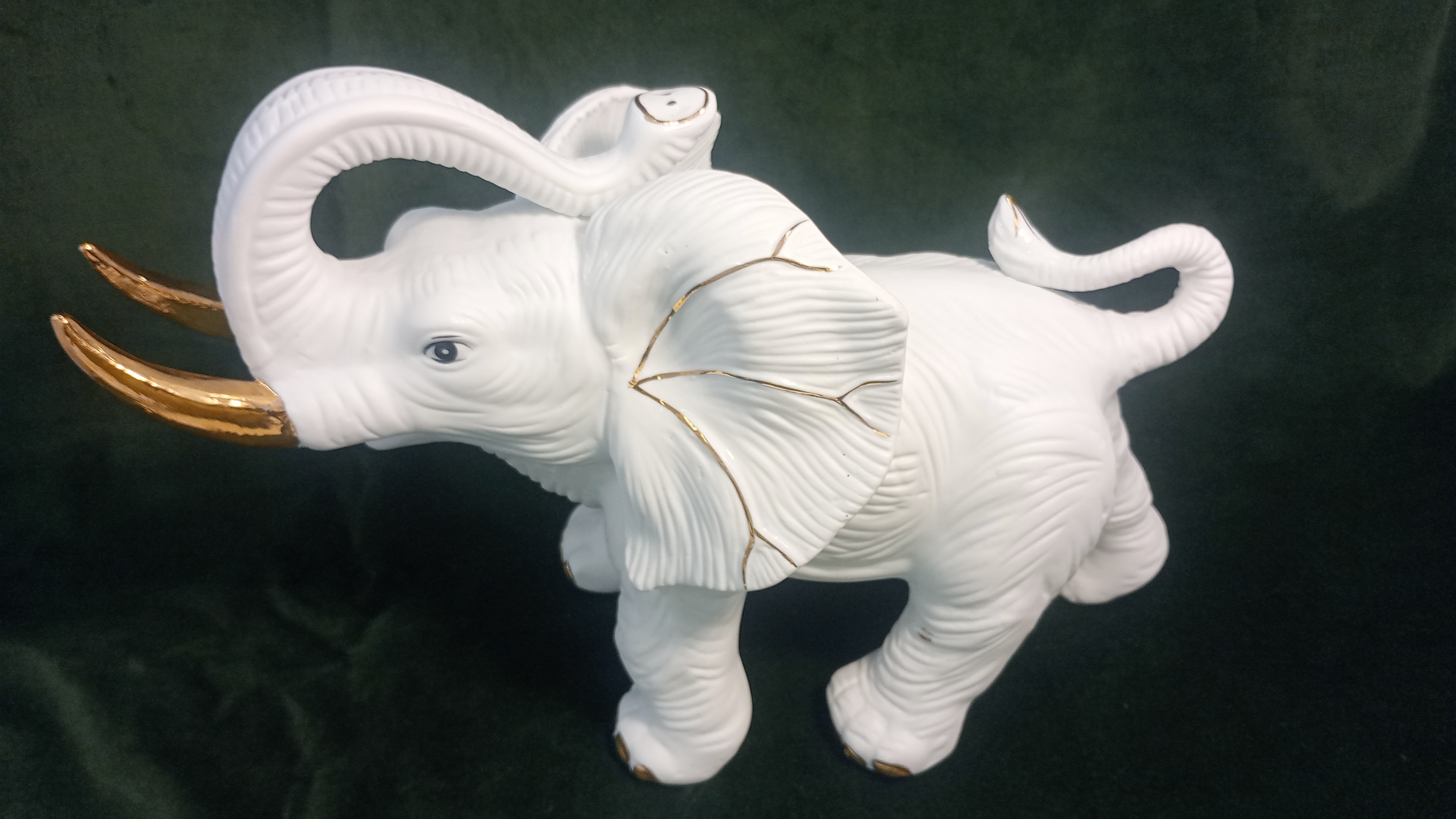  Elefante grande in ceramica bianco e dorato