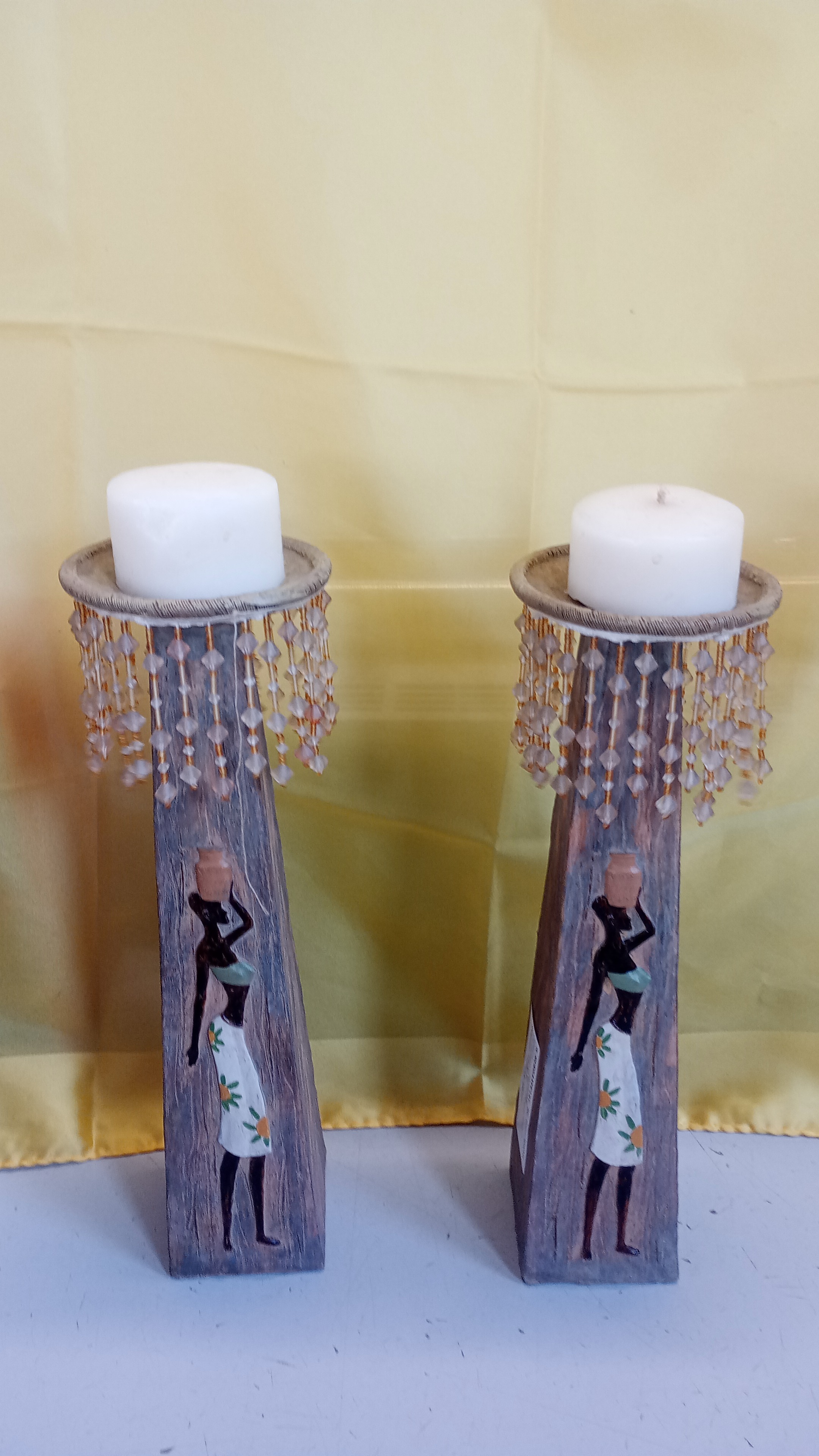  Candelabro in legno disegno africano 