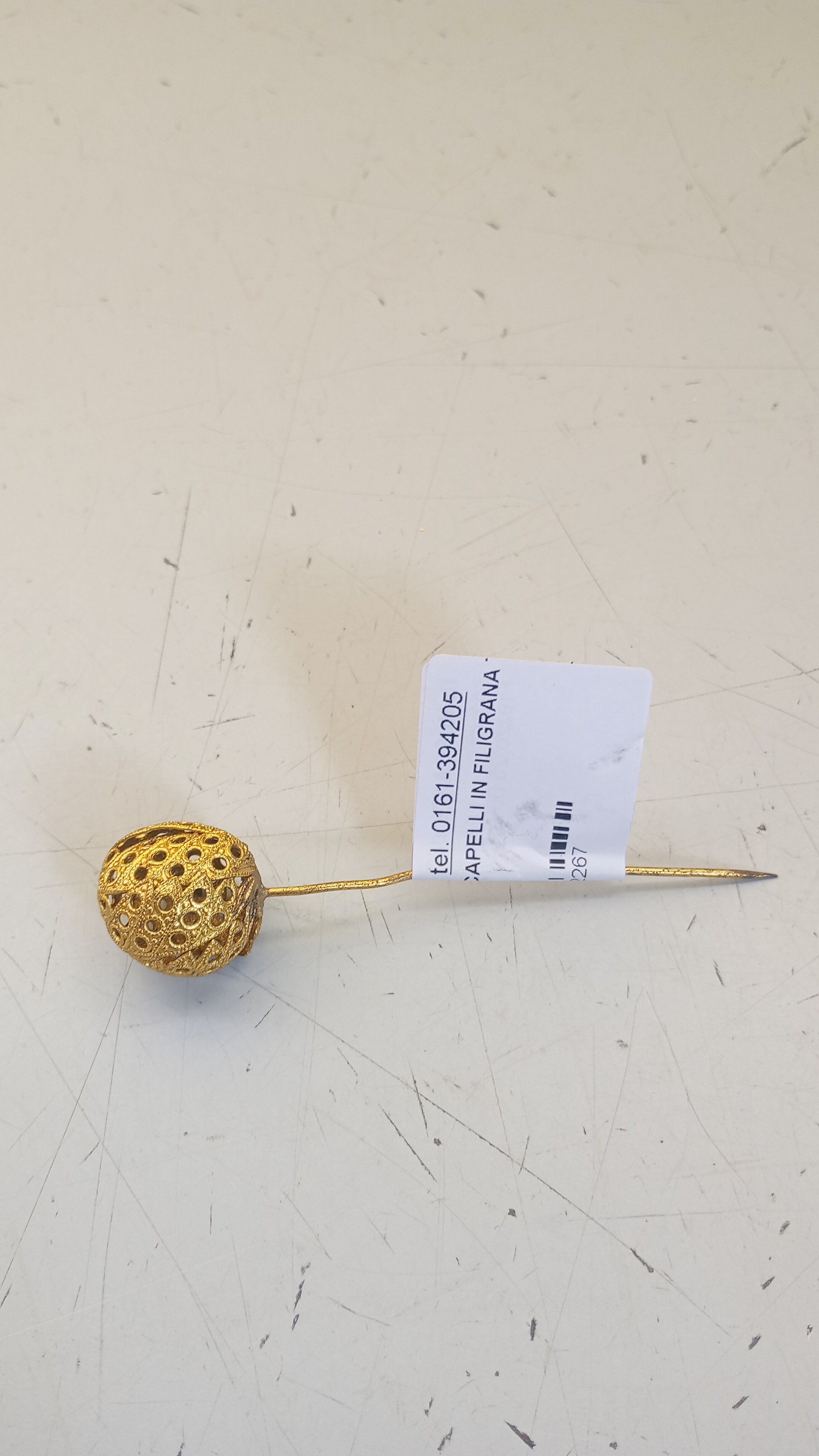 FERMA CAPELLI IN FILIGRANA TARDO 800AG 