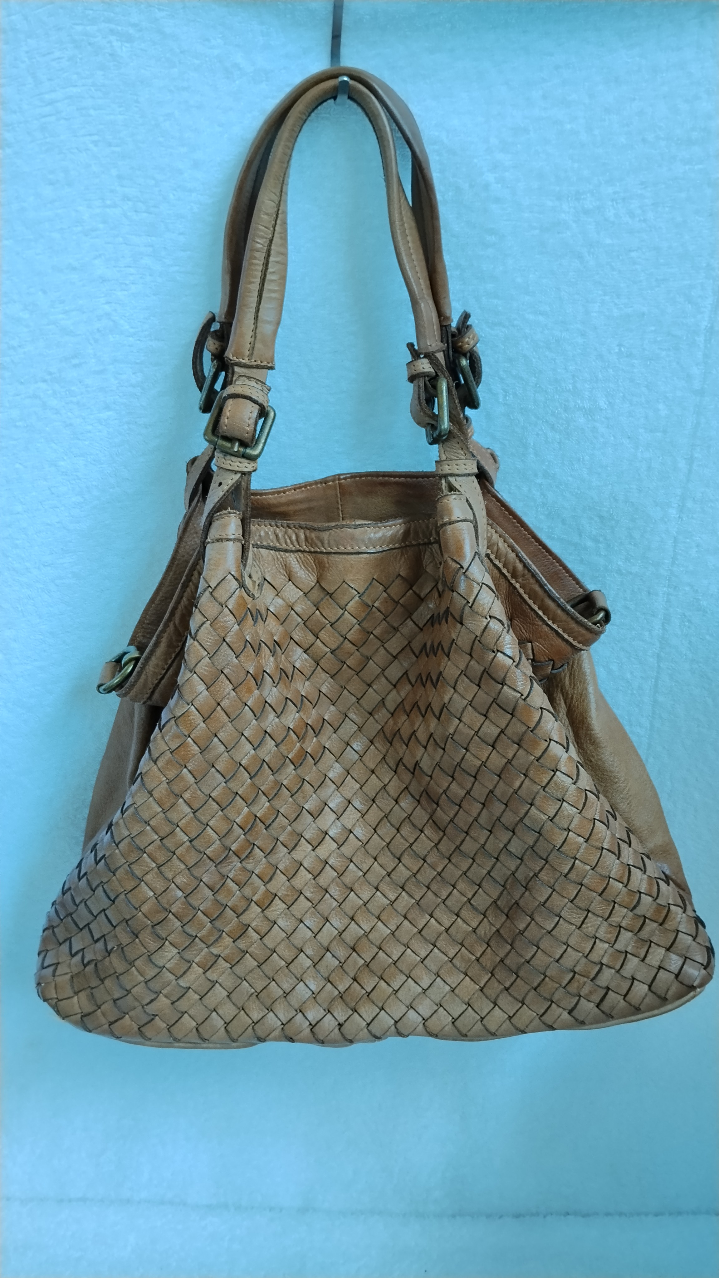 borsa intrecciata in pelle